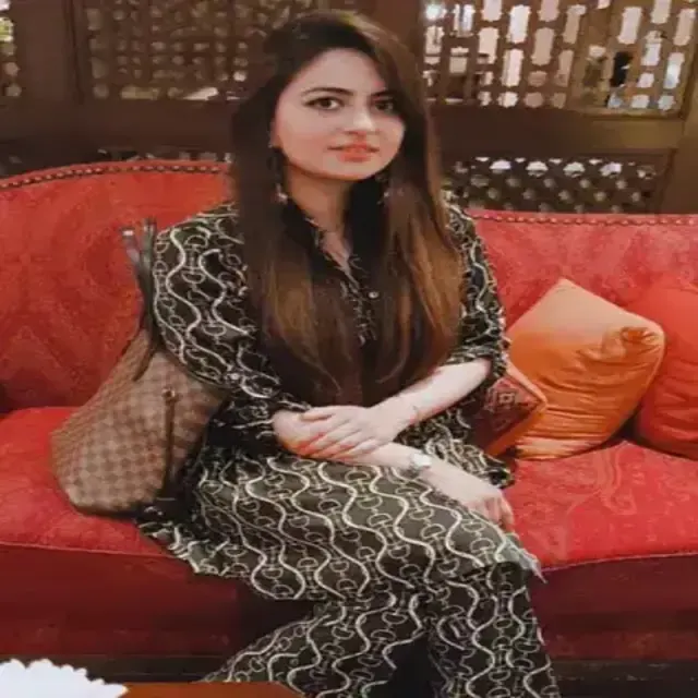 Dr. Madiha Shamsher, seated.